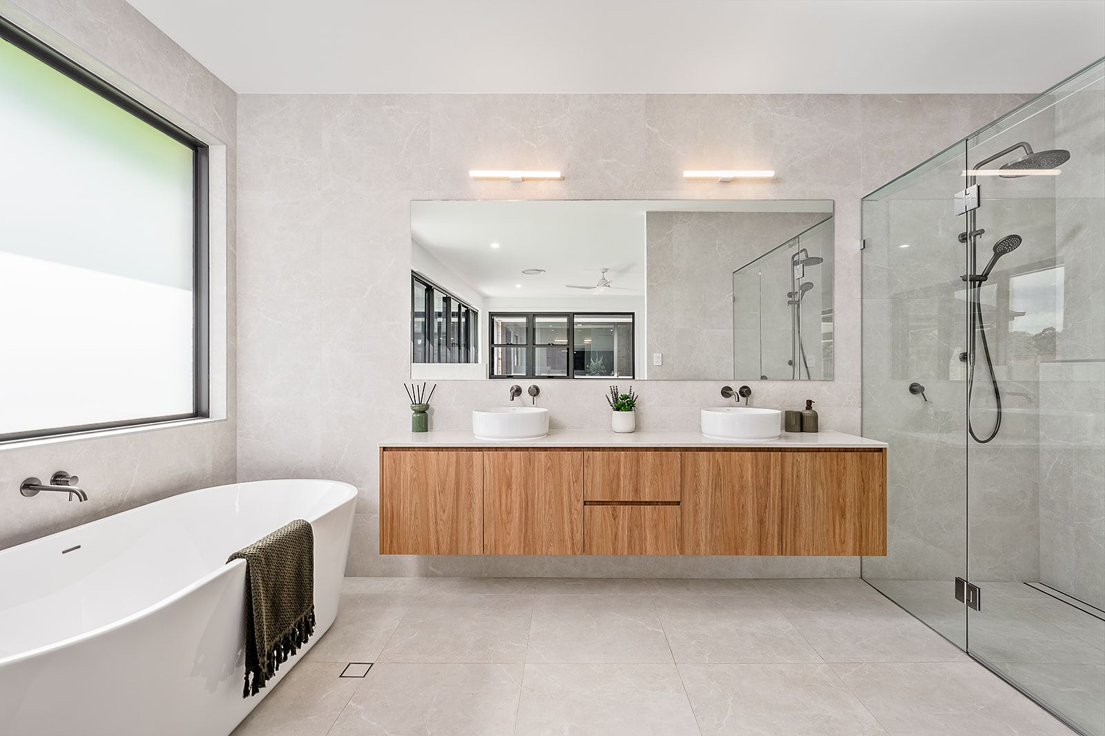 Ensuite with freestanding bath and timber vanity